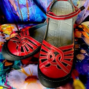 J-41 Shoes.    Red Flats with cut out design pop and strap over ankel